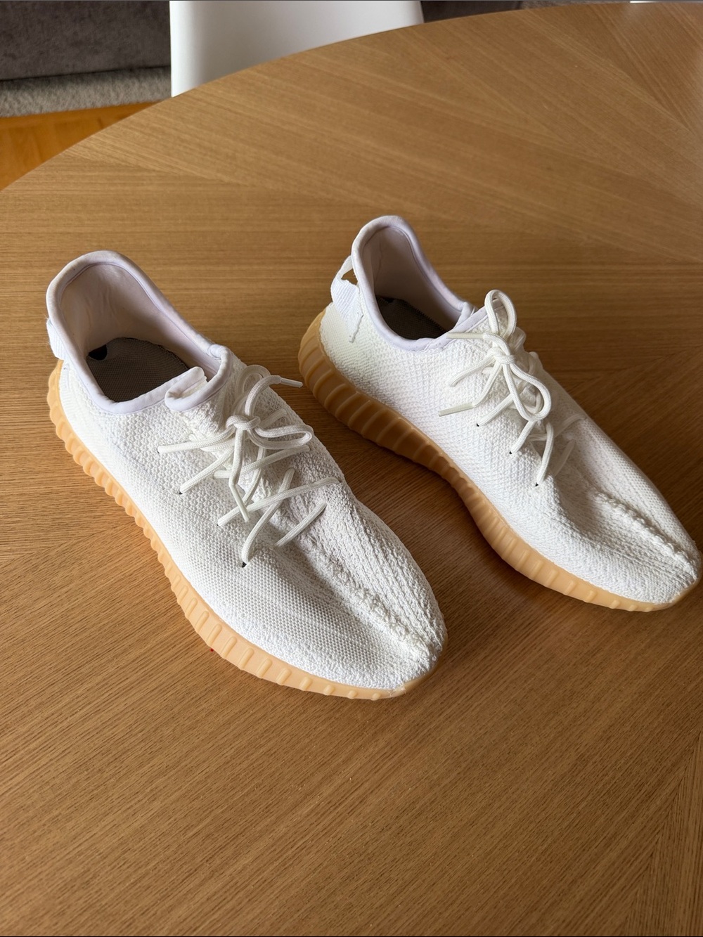 Men's Yeezy’s Knit Lace-Up Sneakers in butter white.